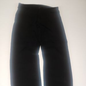 A pair of black rustler pants size 35x30